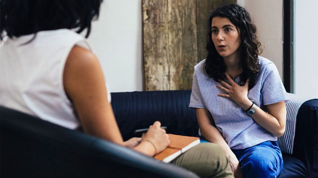 Woman talking to therapist